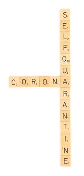 Corona self quarantine scrable letters, isolated on a white background