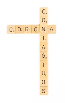 Corona contagious scrable letters, isolated on a white background