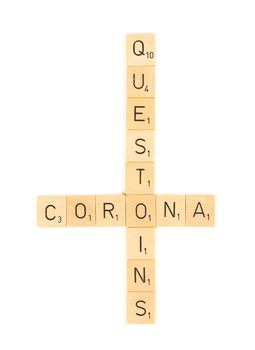 Corona questions scrable letters, isolated on a white background