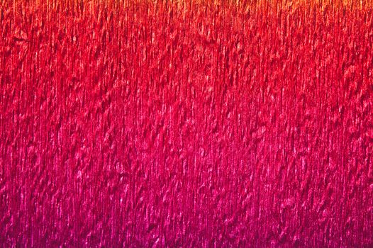 The picture shows a background with red crepe paper