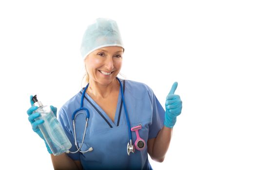 Friendly smiling hospital nurse, or medical professional holding a bottle of hand sanitizer and giving a thumbs up gesture