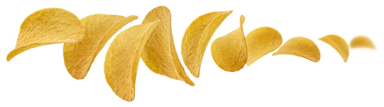 Potato chips levitate on a white background.