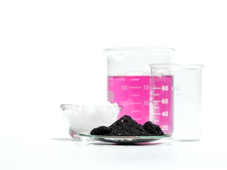 Cosmetic chemicals ingredient on white laboratory table. Potassium Permanganate Liquid, KMnO4, Alcohol, Microcrystalline wax. 