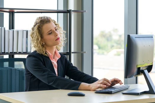 Morning work atmosphere In a modern office. Ukrainian employees ponder on what to report to their supervisor. After clearing the remaining pending work.