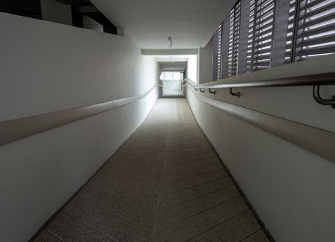 Light at the exit of the corridor in the building