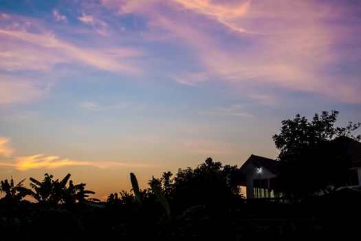 Silhouette of house and small lighting in morning