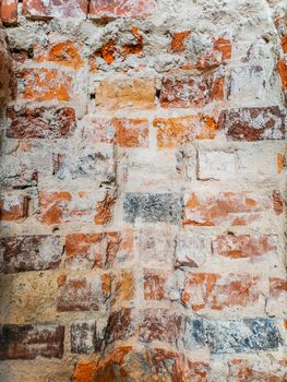 Natural red Brick wall background texture with white concrete