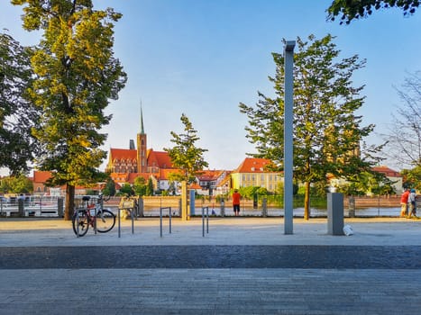 Cityscape of Wroclaw boulevard with cathedrals in backgrounds at sunny day