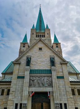 Old white Cathedral building with aquamarine towers in Wroclaw City