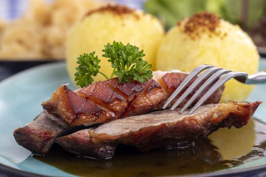 bavarian roasted pork with potato dumlings