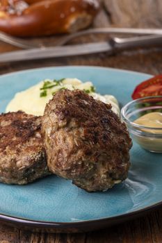 two bavarian meat loafs on a plate