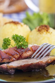 bavarian roasted pork with potato dumlings