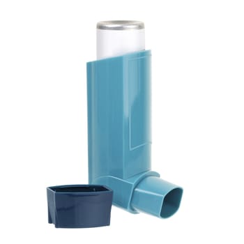 An inhaler for asthma with lid isolated on white with clipping path