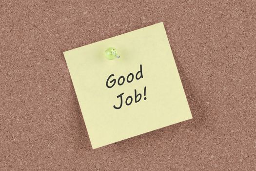 A Good Job post note on cork notice board 