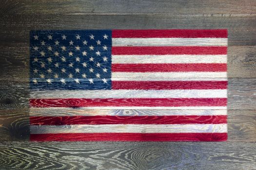 A United states of America flag on rustic old wood surface background stars and stripes old glory