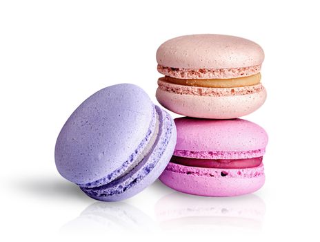 Two macaroon each other and one next on white background