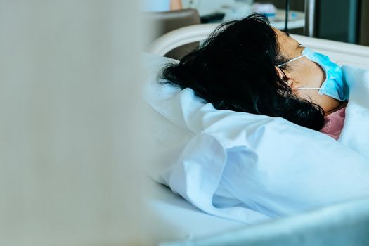 Image of Elderly patients in hospital bed