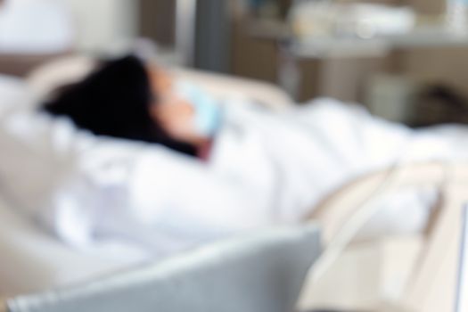 Abstract blur of Elderly patients in hospital bed background