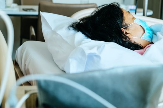 Image of Elderly patients in hospital bed