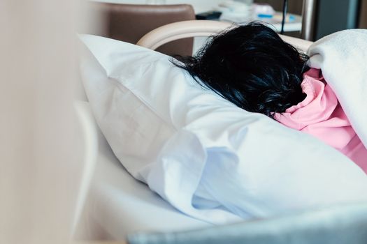 Image of Elderly patients in hospital bed