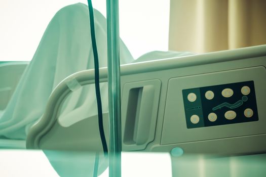 Close up of Patient bed with Elderly patients in hospital