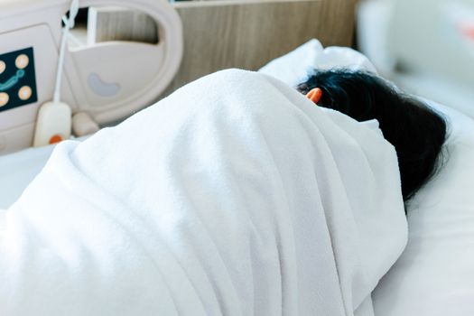 Close up of Patient bed with Elderly patients in hospital