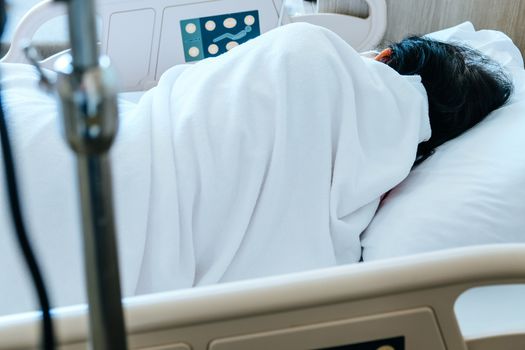 Close up of Patient bed with Elderly patients in hospital