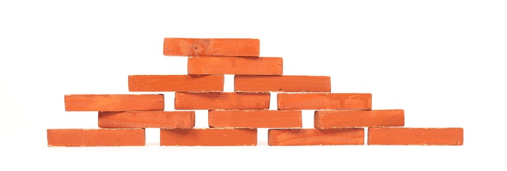 Vintage orange building blocks isolated on white background