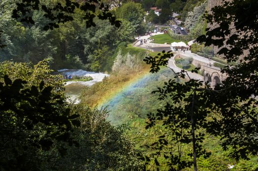 the first jump of the waterfall Marmore with rainbow, Umbria - Italy