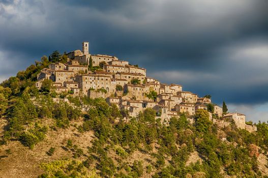 Village in Umbria (Italy) and mountains at summer