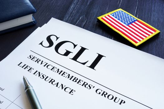 Servicemembers Group Life Insurance SGLI policy and pen.