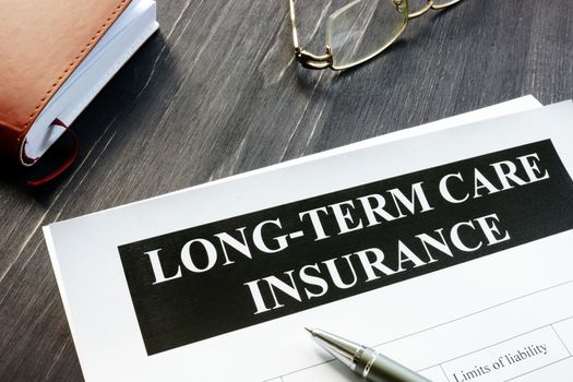 Long-Term Care Insurance agreement policy and notebook.