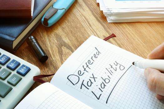Deferred tax liability words on the page.