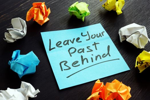 Leave your past behind sign on the memo stick.