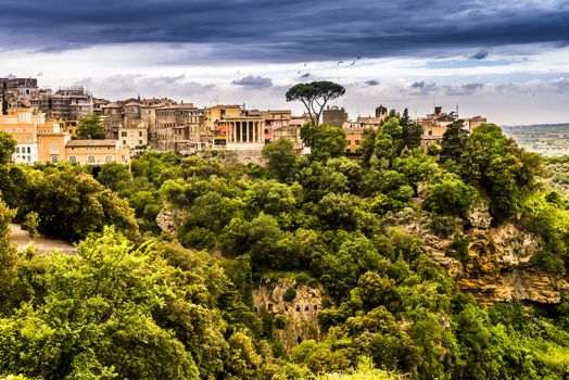 Tivoli is an ancient Italian town in Lazio, about 30 kilometres (19 miles) east-north-east of Rome, at the falls of the Aniene river where it issues from the Sabine hills