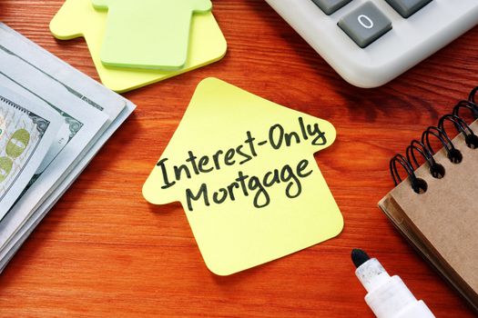 Interest Only Mortgage phrase on the paper home.