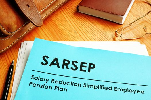 Salary Reduction Simplified Employee Pension Plan SARSEP on the desk.
