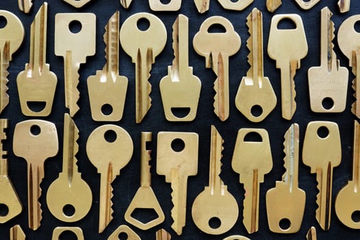 Yellow metal keys on the dark background.