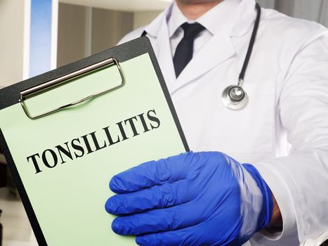 Diagnosis Tonsillitis and Adenoiditis on the green sheet.