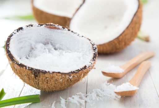 Coconut on white wooden background