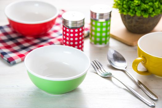 table setting on white wodden table