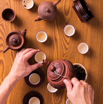 hand serving a chinese tea. those character not a brand name. Those character is just a name of tea type.