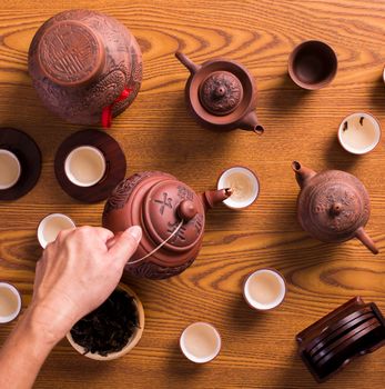 hand serving a chinese tea. those character not a brand name. Those character is just a name of tea type.