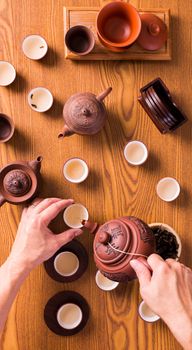 hand serving a chinese tea. those character not a brand name. Those character is just a name of tea type.