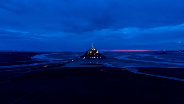 Aerial drone view of Mont Saint Michel bay, France 10-9-19 during summer evening