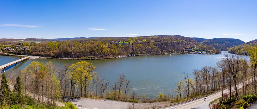 Panorama of the autumn fall colors surrounding Cheat Lake with artificial water surface near Morgantown, West Virginia