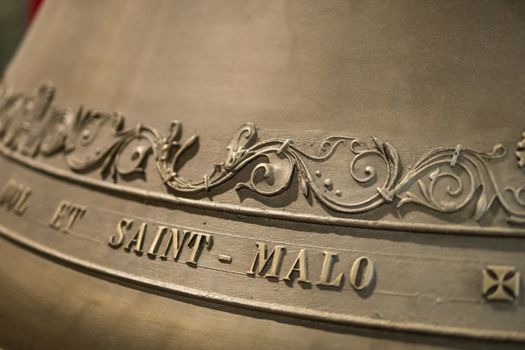 Name of city of Saint Malo engraved on cathedral new bronze bell Saint Malo, France
