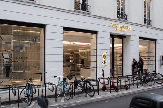 Yves Saint Laurent Store in Paris, France, Luxury brand shop facade on " Rue saint Honoré "
