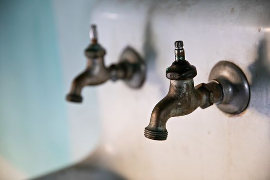 Old vintage facets above a sink