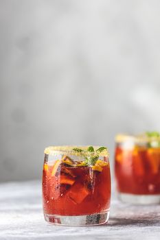 Glass of campari gin spritz close up. Cocktail of sweet, a touch of bitter from the campari and gorgeous fizz from the champagne topper.